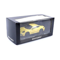 410069601 ミニチャンプス 1/43 ポルシェ 911 (992) GT3 ツーリング 2021 イエロー/ブラックホイール